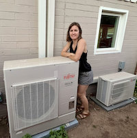 200 - Woman with HVAC heat pump